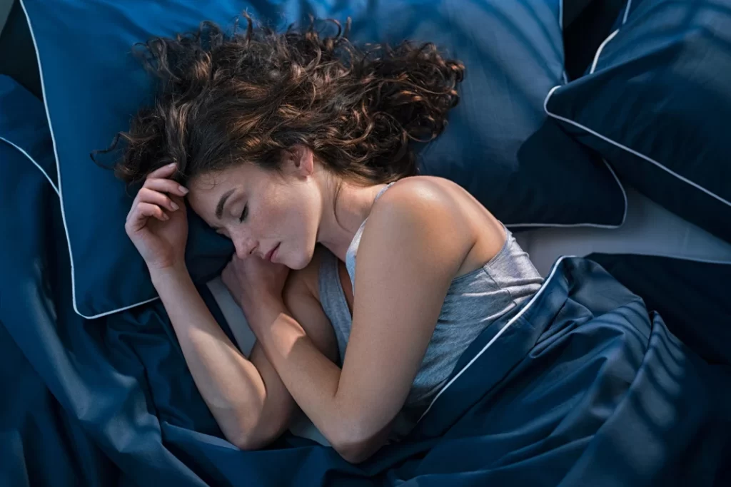 Young attractive girl sleeping deeply. 