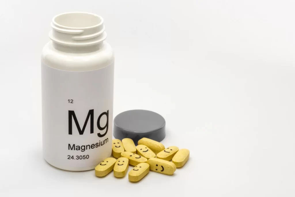 Mg pills with white background. 