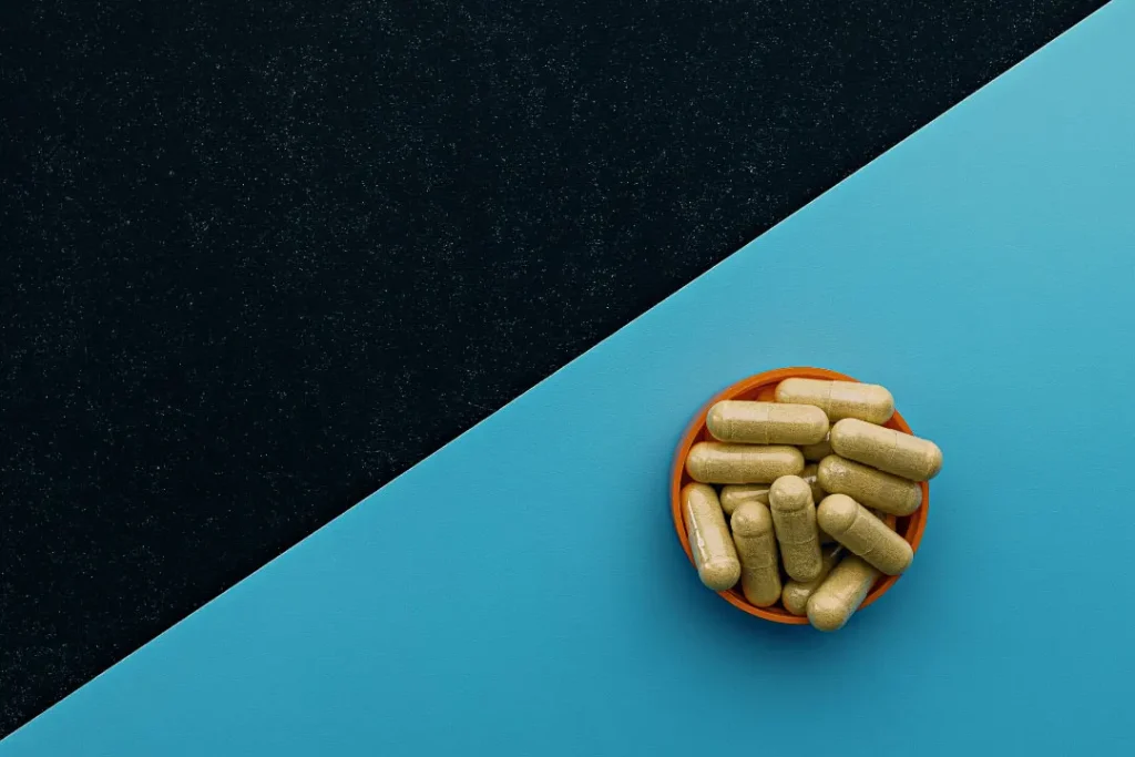 Quercetin pills with black and blue background